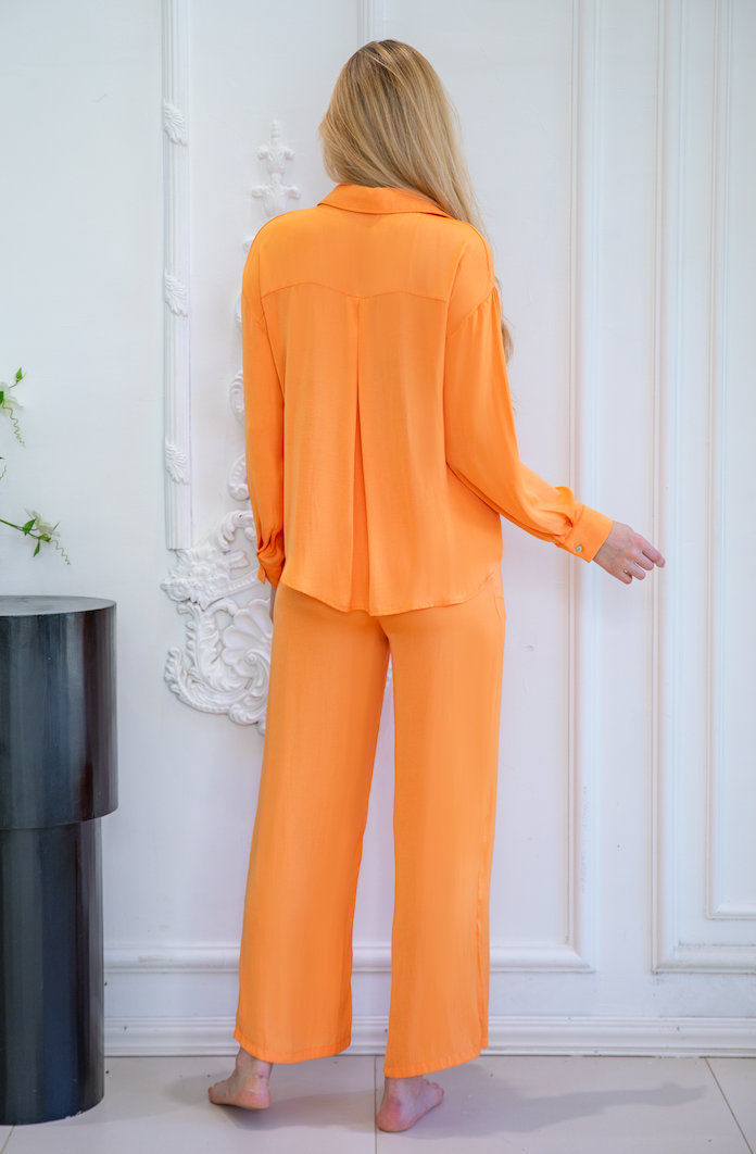 Elegant blue floral pajama set with lace trim from a premier sleepwear factory, crafted by skilled pajamas manufacturers.