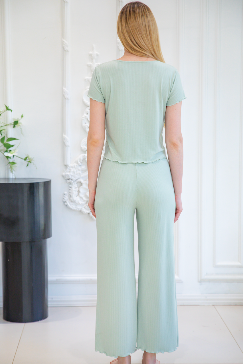 Back view of women’s light green pajama set made by professional sleepwear factory and nightgown factory, designed by trusted pajama manufacturer and reliable pajamas manufacturers.