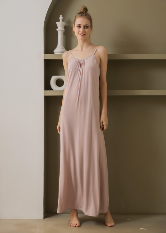 Elegant breathable modal long dress from a top nightgown factory, featuring a pink sleeveless design with thin straps, perfect for a lightweight and comfortable sleepwear option. Crafted by a renowned pajamas manufacturer