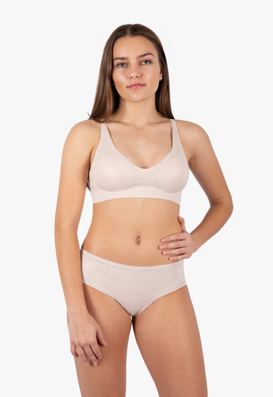 Comfortable beige seamless bra from a top underwear factory, crafted by a leading sleepwear factory or pajamas manufacturers for a sleek and modern fit